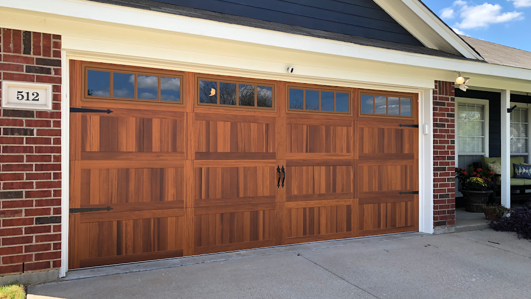 Cedar carriage-style garage door at a brick home